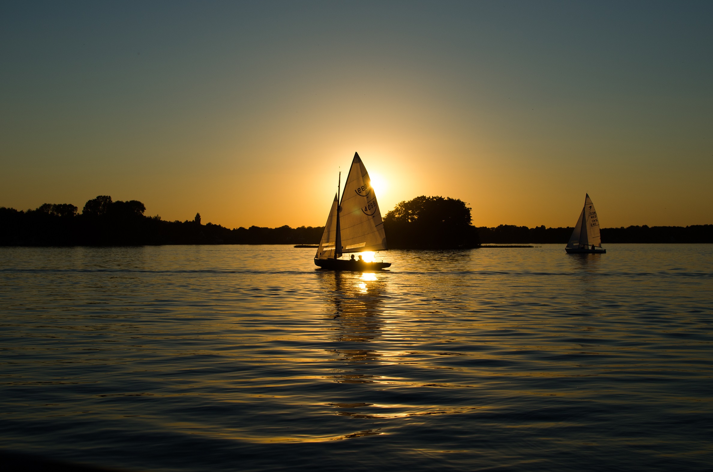 sea-dawn-sunset-boats